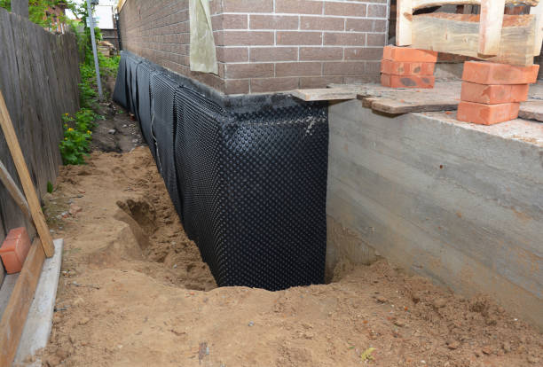 SJ Waterproofing Pros technician performing targeted Crawl Space Encapsulation assessment in East Setauket, NY